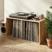 meuble vinyle en chêne sonoma aux dimensions 71 x 34 x 36 cm dans salon